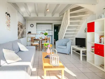 Coin salon dans l'établissement Apartment Cap Océan-5 by Interhome