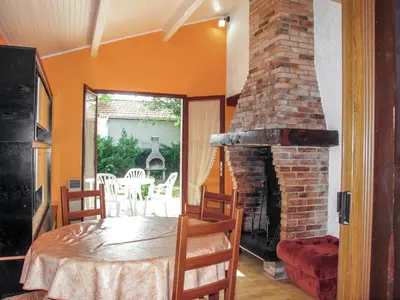 Coin salon dans l'établissement Holiday Home Le Fournil by Interhome