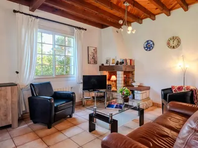 Coin salon dans l'établissement Holiday Home Promenade des Pins by Interhome