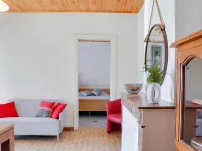 Coin salon dans l'établissement Holiday Home Remember by Interhome