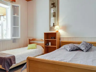 Un ou plusieurs lits dans un hébergement de l'établissement Holiday Home Remember by Interhome