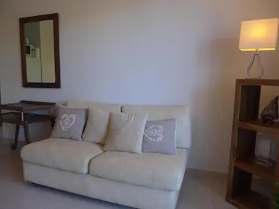 Coin salon dans l'établissement Apartment Selvia Quetia by Interhome