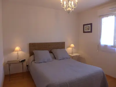 Un ou plusieurs lits dans un hébergement de l'établissement Apartment Selvia Quetia by Interhome