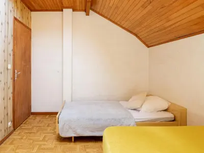 Un ou plusieurs lits dans un hébergement de l'établissement Holiday Home Sicard-10 by Interhome