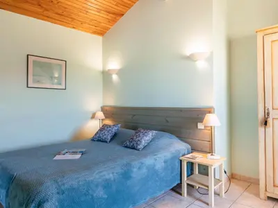 Un ou plusieurs lits dans un hébergement de l'établissement Holiday Home Villa Marine by Interhome