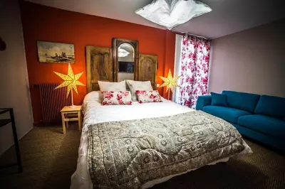 Un ou plusieurs lits dans un hébergement de l'établissement Les chambres de Lily