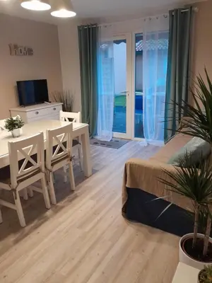 Télévision ou salle de divertissement dans l'établissement CARPE DIEM - La Villa des Vacances
