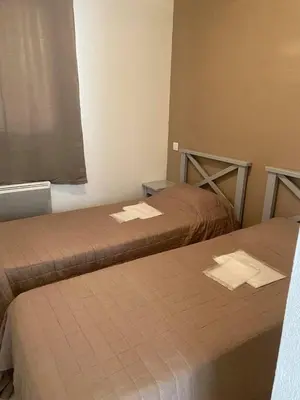 Un ou plusieurs lits dans un hébergement de l'établissement Laouchet Le Hameau des Grands Lacs