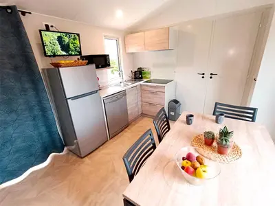 Cuisine ou kitchenette dans l'établissement Domaine de la Forge