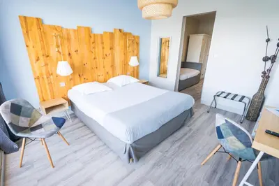 Un ou plusieurs lits dans un hébergement de l'établissement Le Relais Du Lac