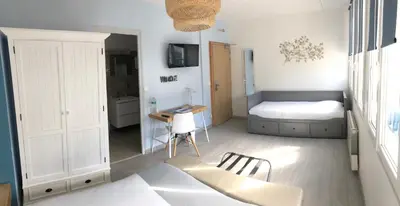 Un ou plusieurs lits dans un hébergement de l'établissement Le Relais Du Lac