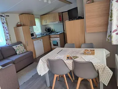 Cuisine ou kitchenette dans l'établissement GH Vacances La Réserve