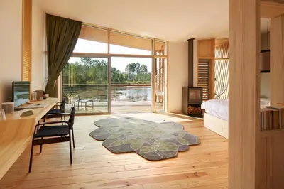 Un ou plusieurs lits dans un hébergement de l'établissement Les Échasses Golf & Surf Eco Lodge