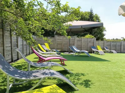 Jardin de l'établissement Camping familial les chalets d'Uza