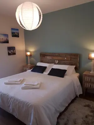 Un ou plusieurs lits dans un hébergement de l'établissement Apartment Cap Larros