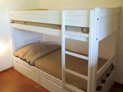 Un ou plusieurs lits dans un hébergement de l'établissement Apartment Les Cottages du Lac T3 Tradition by Interhome