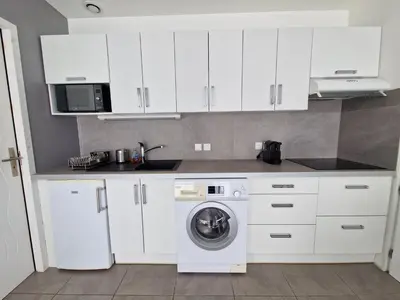Cuisine ou kitchenette dans l'établissement Beness'Appart 5km Capbreton