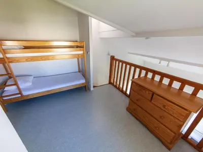 Un ou plusieurs lits dans un hébergement de l'établissement Holiday Home Résidence Dune Blanche - Soleil by Interhome