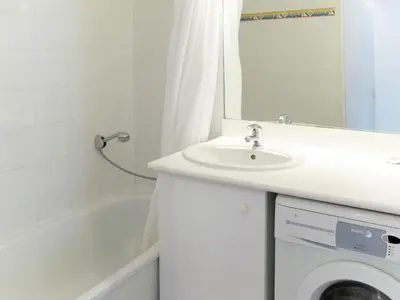 Salle de bains dans l'établissement Holiday Home Résidence Dune Blanche - Sable by Interhome