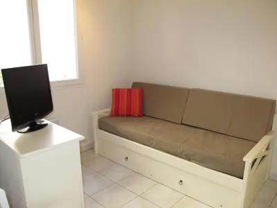 Télévision ou salle de divertissement dans l'établissement Holiday Home Résidence Indigo II-1 by Interhome
