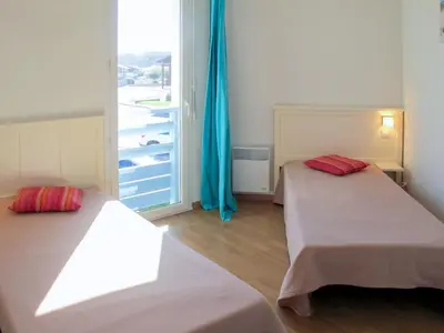 Un ou plusieurs lits dans un hébergement de l'établissement Holiday Home Résidence Indigo II-2 by Interhome