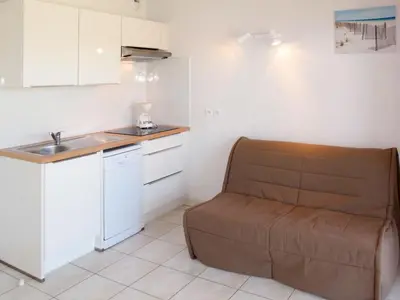 Cuisine ou kitchenette dans l'établissement Apartment Résidence Belle Dune-2 by Interhome