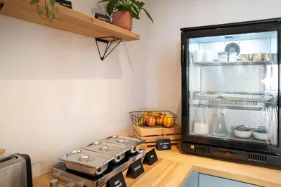 Cuisine ou kitchenette dans l'établissement Logis Hotel de France
