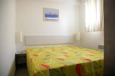 Un ou plusieurs lits dans un hébergement de l'établissement Appartement cosy Vieux Boucau 22m² + Wifi