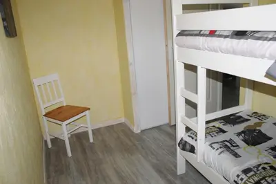 Un ou plusieurs lits dans un hébergement de l'établissement Appartement Boucou