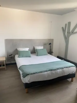 Un ou plusieurs lits dans un hébergement de l'établissement Boutique Hotel Lumaa Marinero