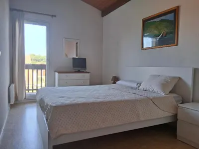 Un ou plusieurs lits dans un hébergement de l'établissement Villa patio avec piscine, à 400m des commerces et 6km de plage - Animaux admis - FR-1-239-83