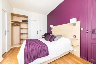 Un ou plusieurs lits dans un hébergement de l'établissement Hotel Helios - Golf