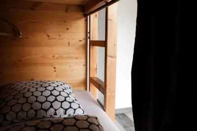 Un ou plusieurs lits dans un hébergement de l'établissement BodyGo Surfhouse