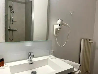 Salle de bains dans l'établissement Grand Hotel