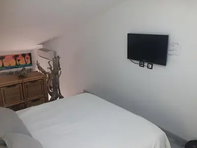 Télévision ou salle de divertissement dans l'établissement Loft Zen Climatisé