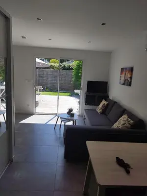 Coin salon dans l'établissement L'appartement des deux chênes