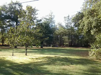 Jardin de l'établissement Les Hotes Des Guillemets