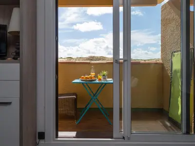 Balcon ou terrasse dans l'établissement Studio rénové face à la dune, proche plage et commerces, idéal pour 2 personnes - FR-1-239-150