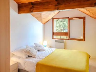 Un ou plusieurs lits dans un hébergement de l'établissement Apartment Les Landaises-5 by Interhome