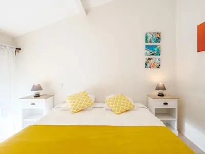 Un ou plusieurs lits dans un hébergement de l'établissement Apartment L'Oustalet-5 by Interhome