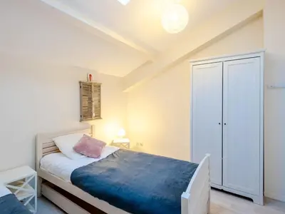 Un ou plusieurs lits dans un hébergement de l'établissement Apartment L'Oustalet-5 by Interhome