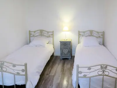Un ou plusieurs lits dans un hébergement de l'établissement Holiday Home Aucéloun by Interhome