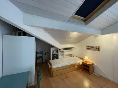 Un ou plusieurs lits dans un hébergement de l'établissement T3 Duplex avec Piscine, Terrasse et Tennis à Soustons - FR-1-379-78
