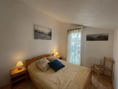 Un ou plusieurs lits dans un hébergement de l'établissement T3 Duplex avec Piscine, Terrasse et Tennis à Soustons - FR-1-379-78