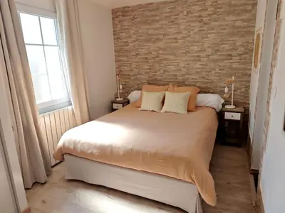 Un ou plusieurs lits dans un hébergement de l'établissement Maison d'hôtes - La Forge de Clermont