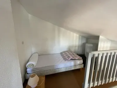 Un ou plusieurs lits dans un hébergement de l'établissement Appartement T2 Mezzanine avec Terrasse Proche Lac - Animaux Acceptés ! - FR-1-379-27