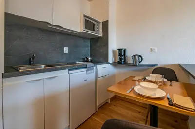 Cuisine ou kitchenette dans l'établissement CERISE Dax - Les Jardins du Lac