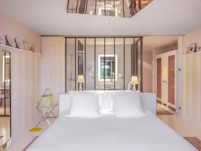Un ou plusieurs lits dans un hébergement de l'établissement Hotel La Co(o)rniche