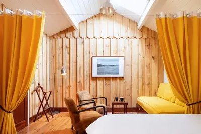 Un ou plusieurs lits dans un hébergement de l'établissement Hotel de La Plage