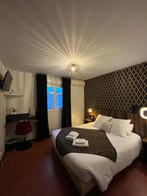 Un ou plusieurs lits dans un hébergement de l'établissement FastHôtel Mont de Marsan - Un Hôtel FH Collection